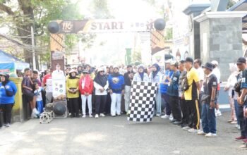 Semarak Milangkala ke-116 Kecamatan Situraja, Warga Tumpah Ruah Ikuti Gerak Jalan Sehat